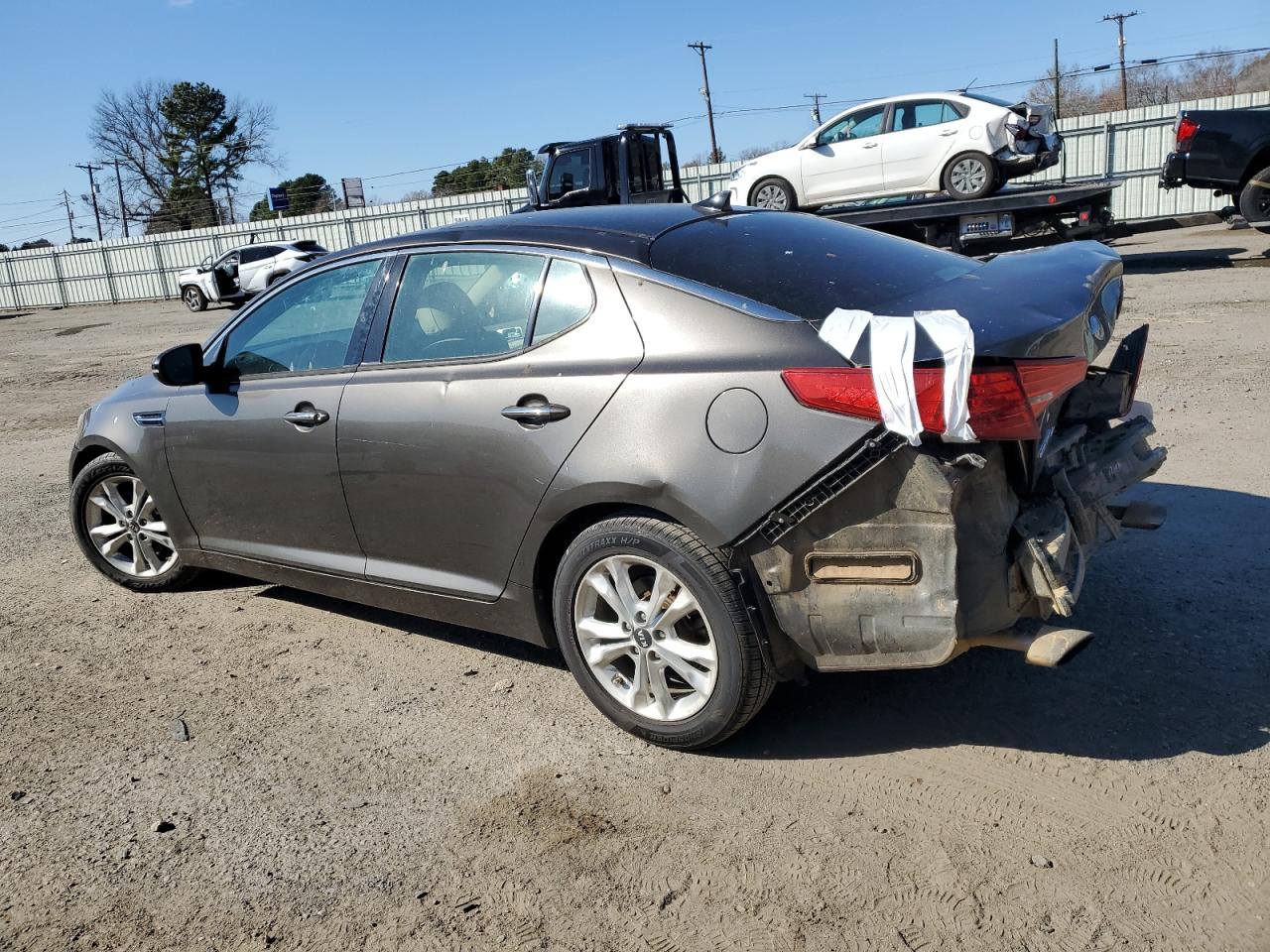 2011 KIA Optima VIN KNAGN4A74B5082921 Copart auction photo, rear end / minor dent/scratches damage thumbnail 2
