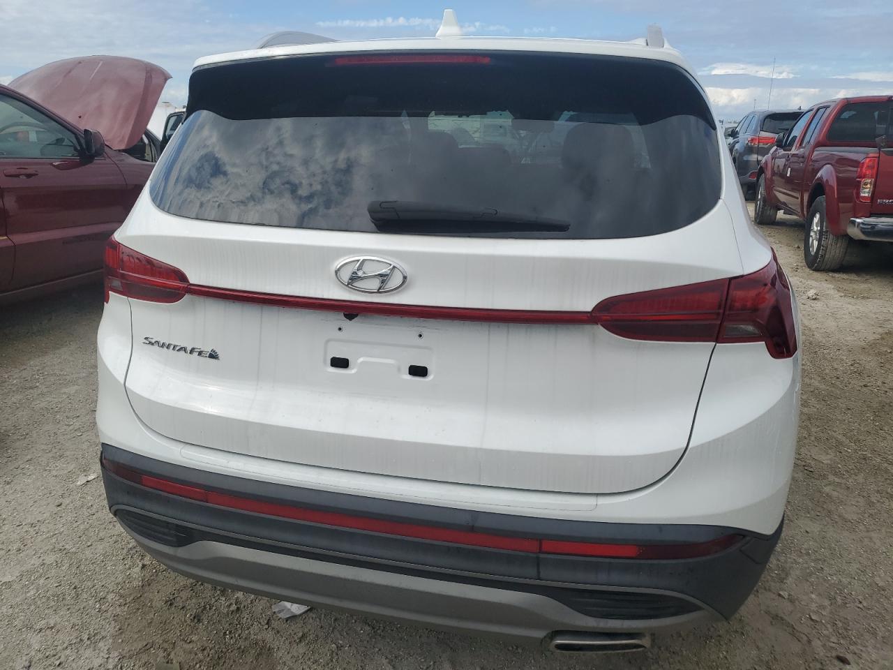 2023 Hyundai Santa Fe VIN 5NMS24AJ4PH489093 Copart auction photo, water/flood damage thumbnail 6