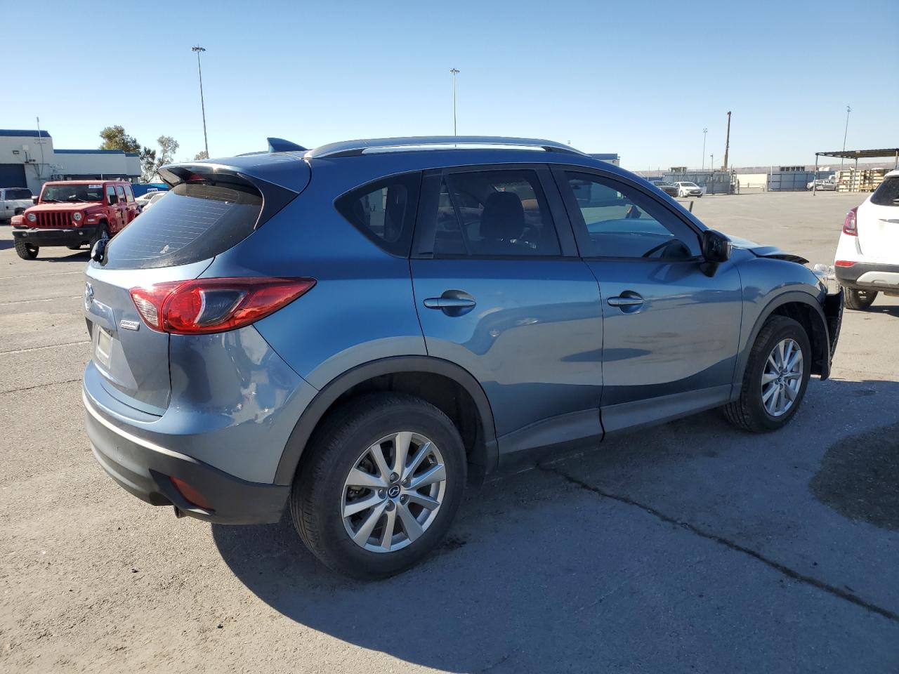 2016 Mazda CX-5 VIN JM3KE2BY2G0685094 Copart auction photo, front end / mechanical damage thumbnail 3