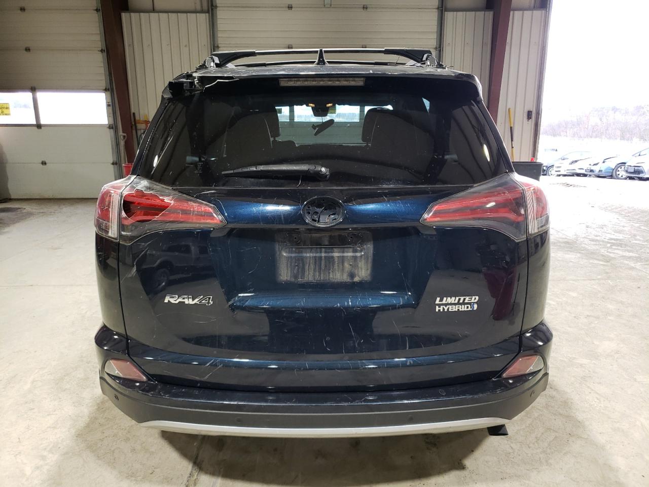 2017 Toyota RAV 4 VIN JTMDJREV3HD118085 Copart auction photo, top/roof / rear end damage thumbnail 6