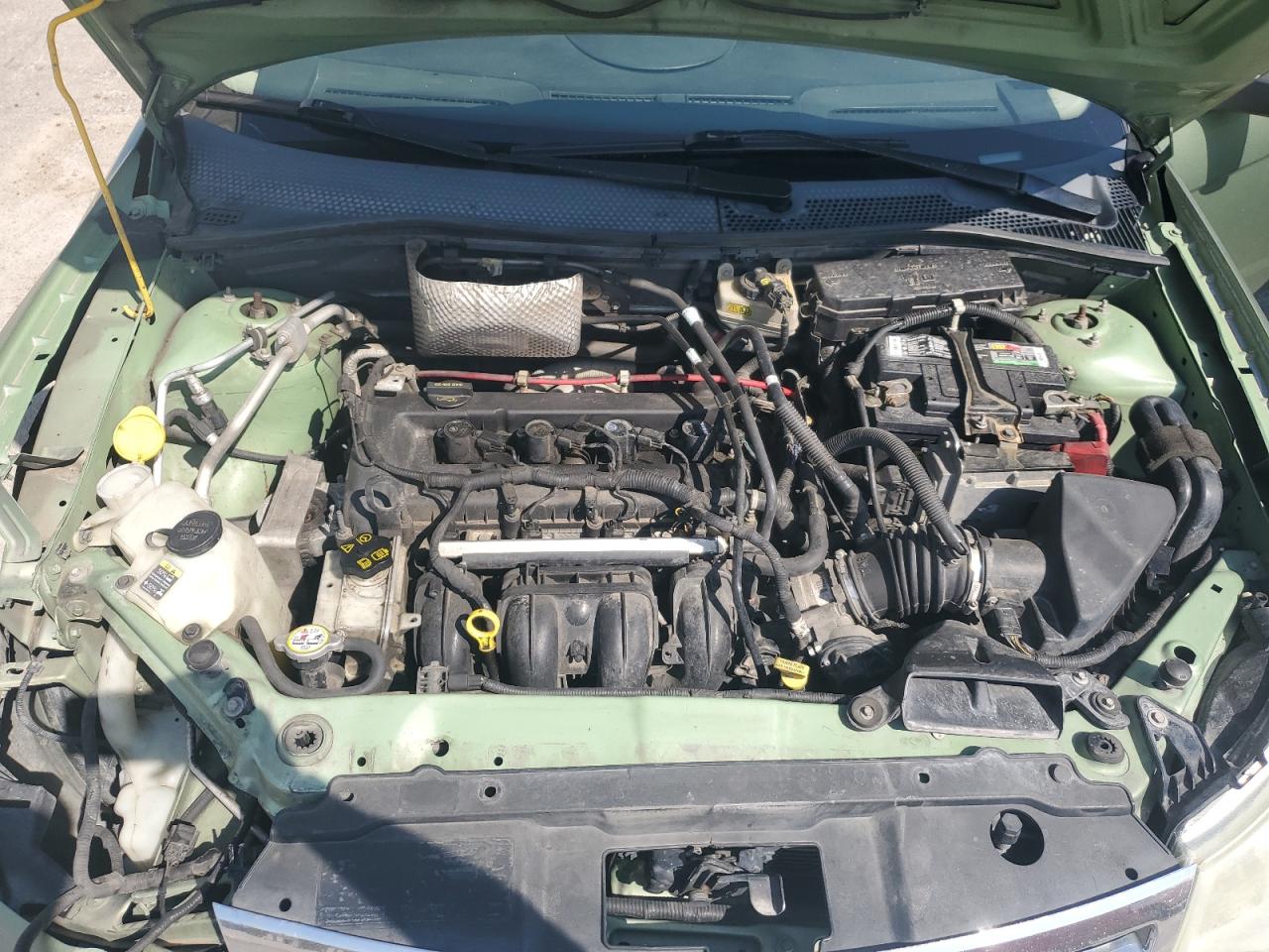 2008 Ford Focus VIN 1FAHP35N08W158471 Copart auction photo, front end / mechanical damage thumbnail 12
