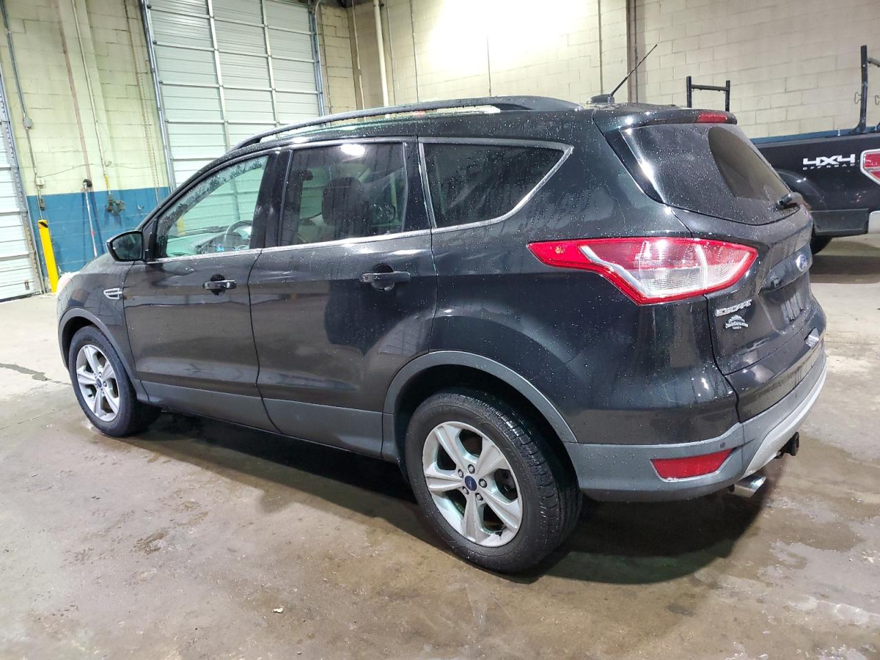 2014 Ford Escape VIN 1FMCU0GX3EUE05298 Copart auction photo, undercarriage / minor dent/scratches damage thumbnail 2