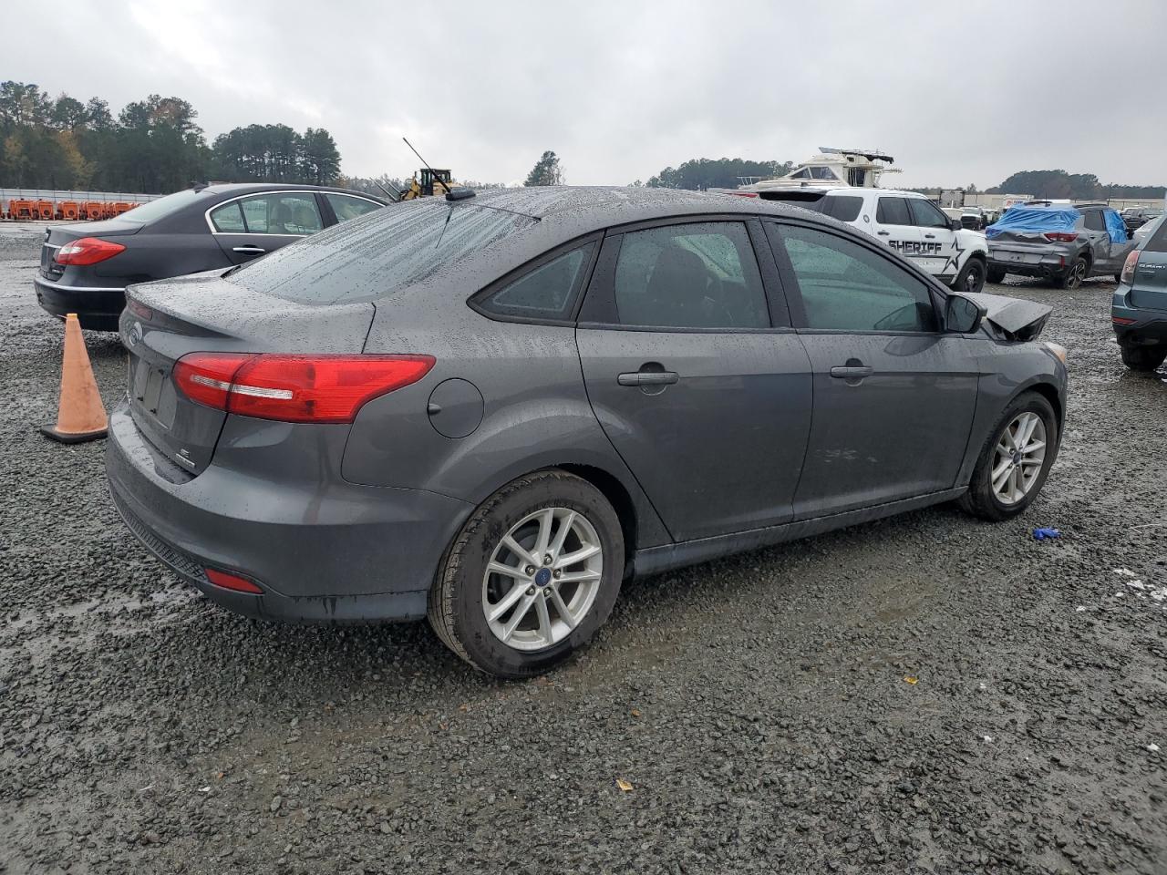 2015 Ford Focus VIN 1FADP3F27FL214598 Copart auction photo, front end damage thumbnail 3