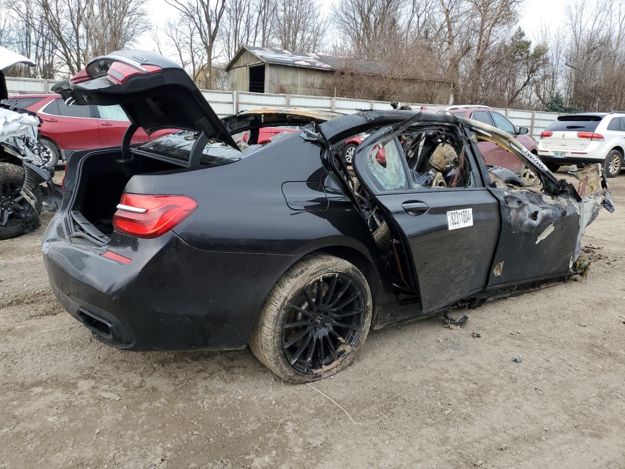 2018 BMW 7er VIN WBA7F2C57JG424927 Copart auction photo, burn / missing/altered vin damage thumbnail 3