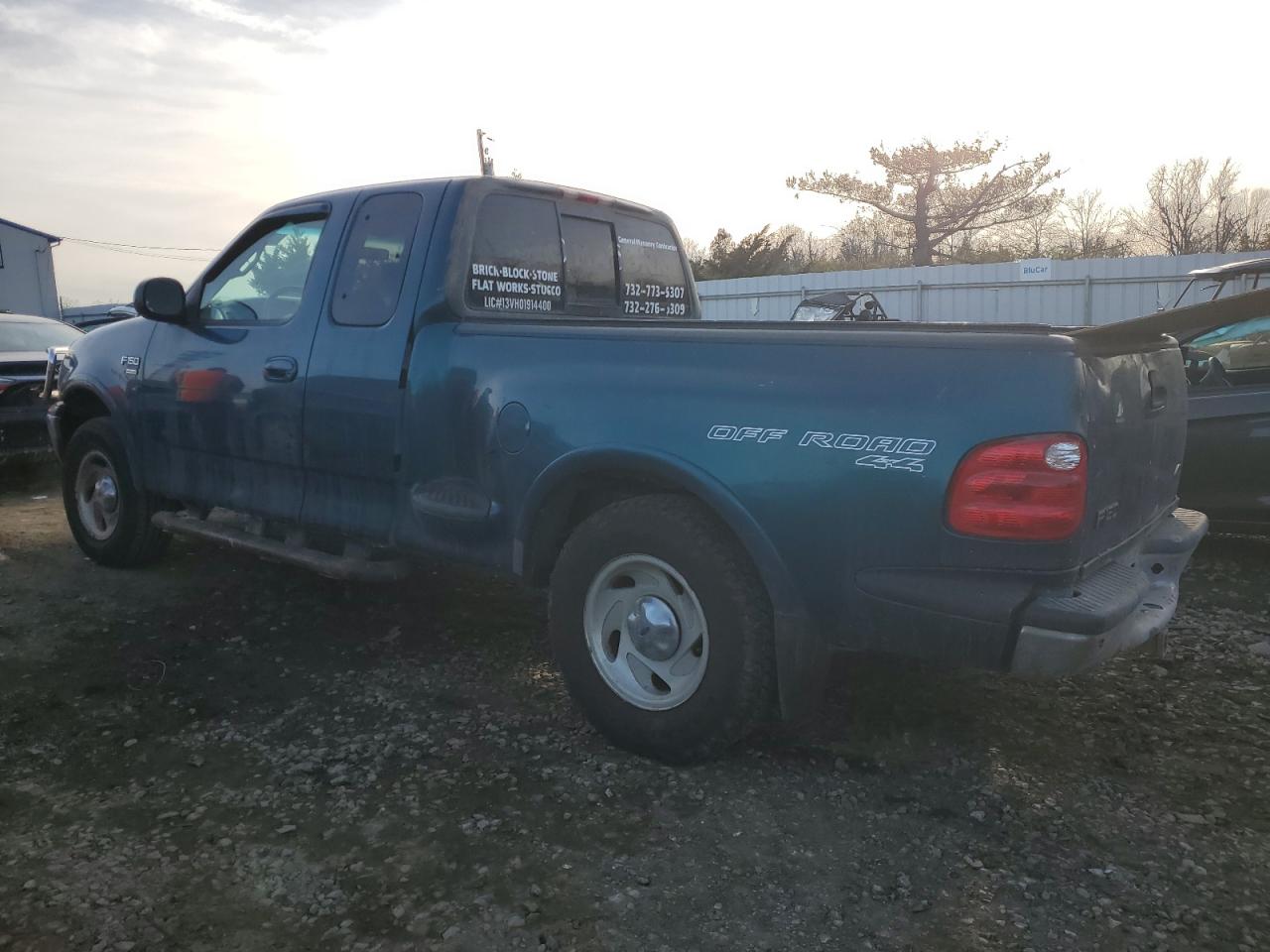2001 Ford F-150 VIN 1FTRX08L41KA65540 Copart auction photo, side damage thumbnail 2