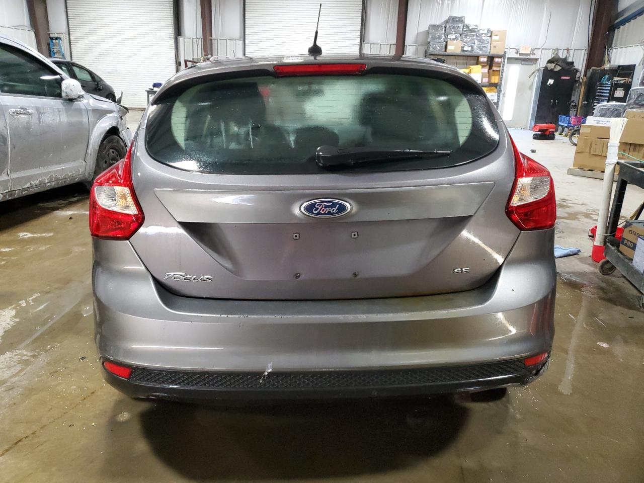 2012 Ford Focus VIN 1FAHP3K2XCL255276 Copart auction photo, front end / side damage thumbnail 6