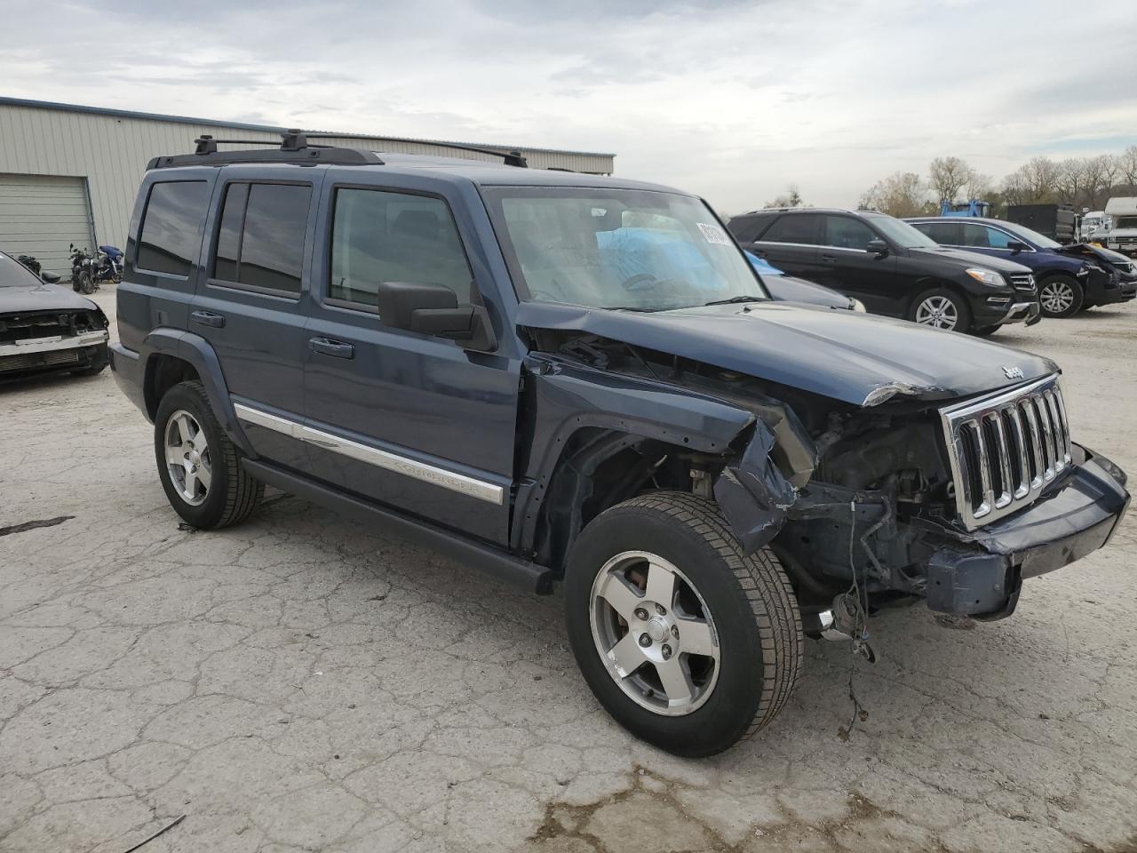 2010 Jeep Commander VIN 1J4RG4GK6AC119618 Copart auction photo, front end damage thumbnail 4