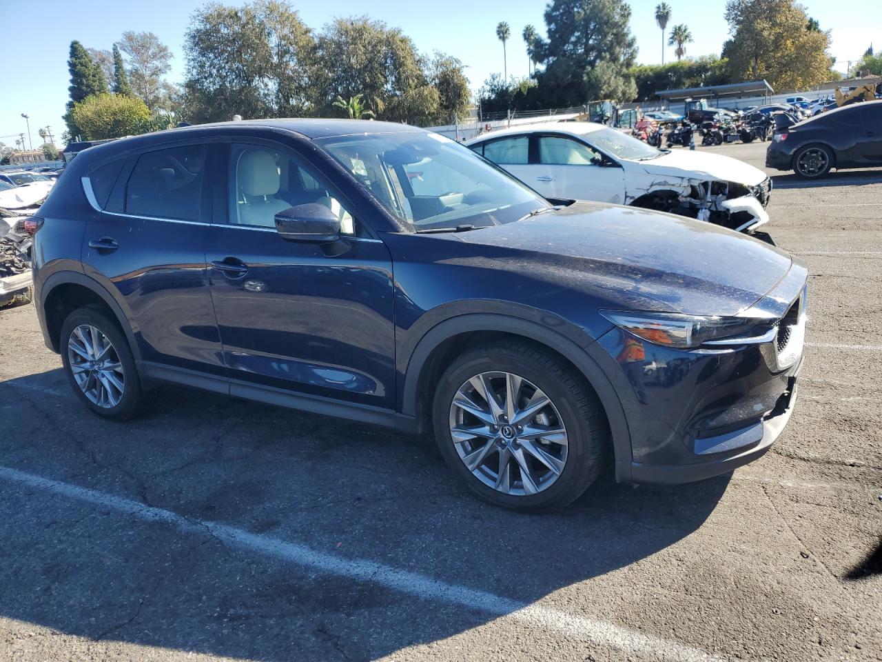2021 Mazda CX-5 VIN JM3KFADM6M0470220 Copart auction photo, side / undercarriage damage thumbnail 4