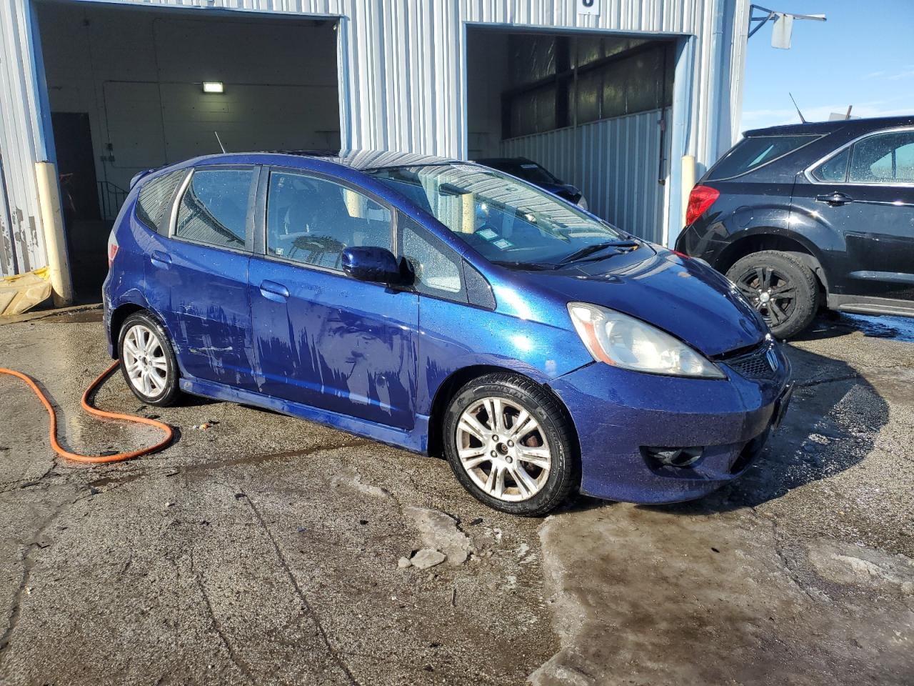 2011 Honda Fit VIN JHMGE8H53BC008799 Copart auction photo, all over damage thumbnail 4
