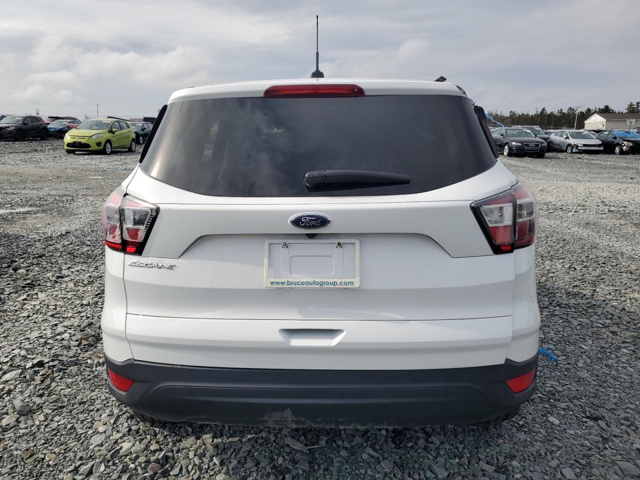 2017 Ford Escape VIN 1FMCU0F75HUA55758 Copart auction photo, all over damage thumbnail 6