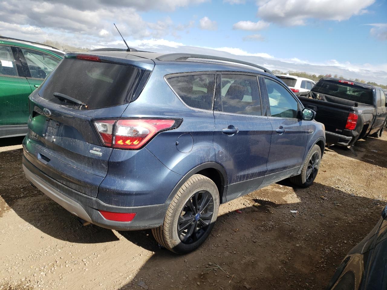 2018 Ford Escape VIN 1FMCU0GD2JUC32356 Copart auction photo, minor dent/scratches damage thumbnail 3