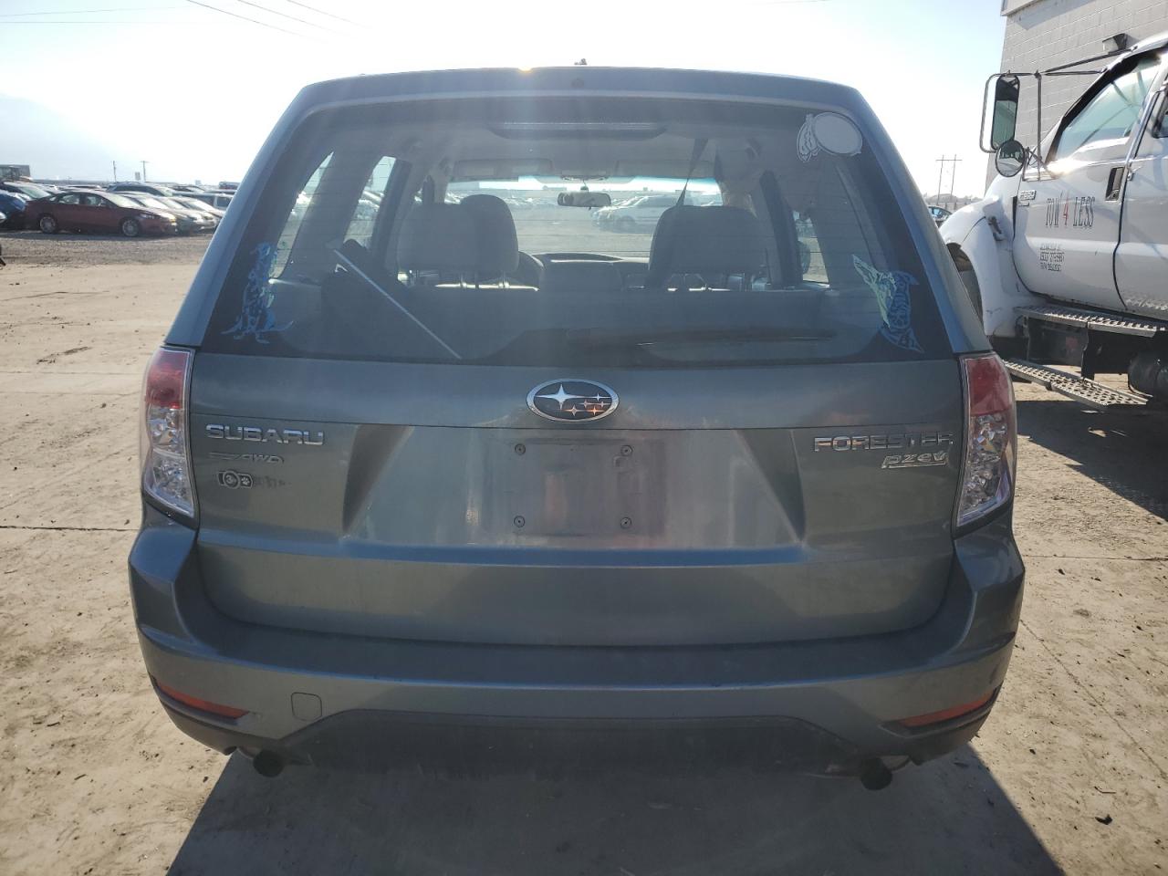 2010 Subaru Forester VIN JF2SH6AC9AH743452 Copart auction photo, side / all over damage thumbnail 6