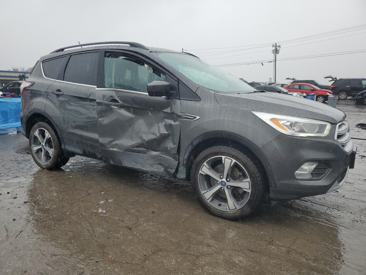 2018 Ford Escape VIN 1FMCU9HD6JUB21960 Copart auction photo, side / minor dent/scratches damage thumbnail 4