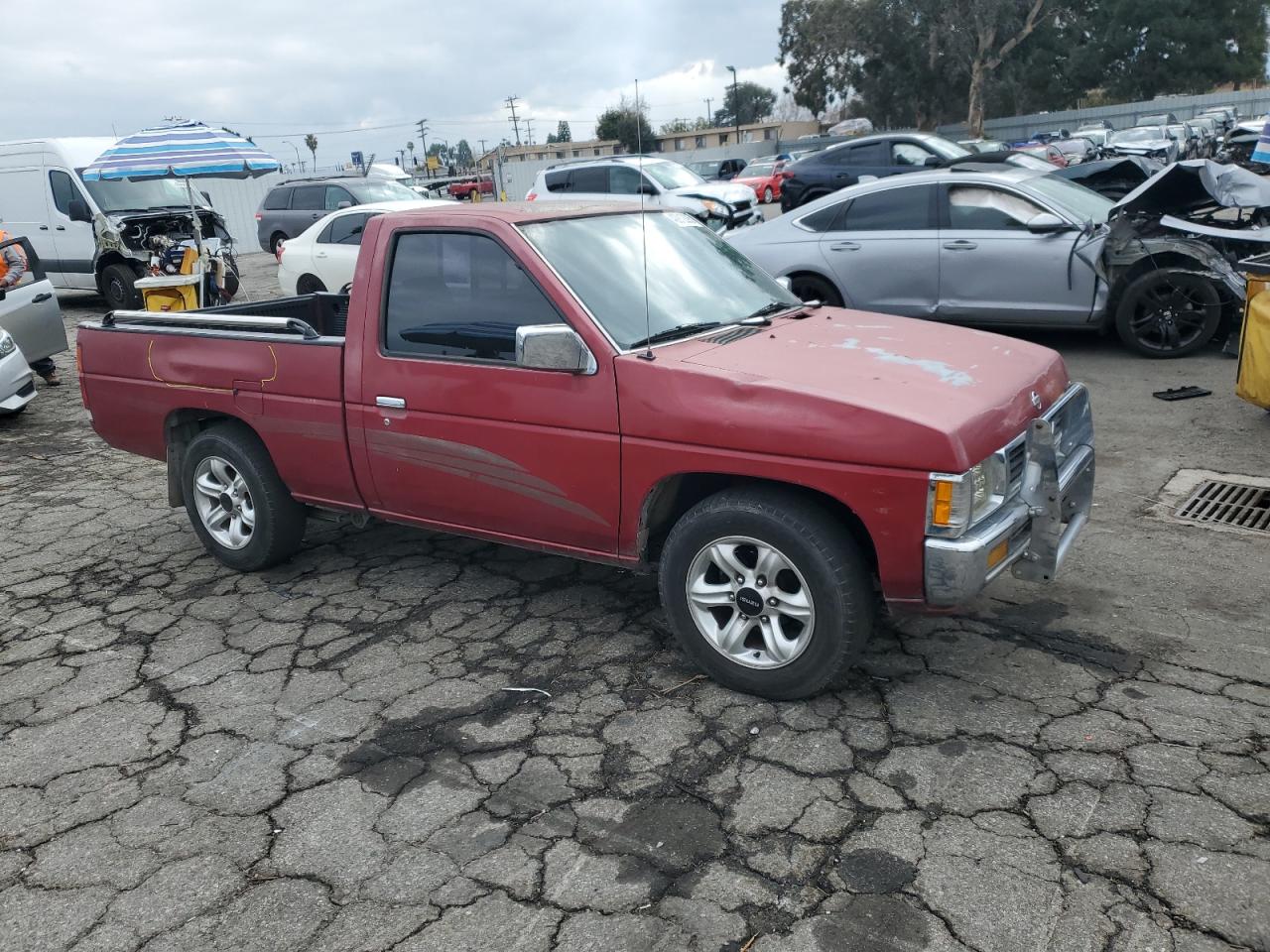 1995 Nissan Navara (Frontier) VIN 1N6SD11SXSC318998 Copart auction photo, rear end / minor dent/scratches damage thumbnail 4