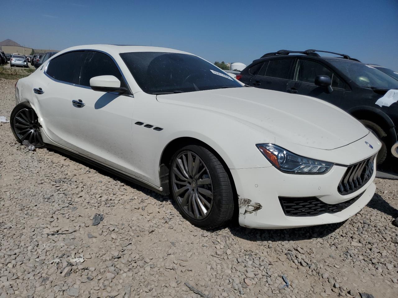 2018 Maserati Ghibli VIN ZAM57YTA2J1300845 Copart auction photo, rear end damage thumbnail 4