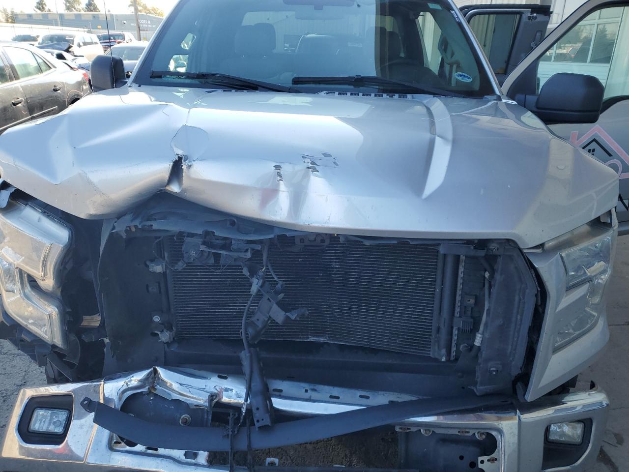 2015 Ford F-150 VIN 1FTEX1E89FFA40654 Copart auction photo, front end / side damage thumbnail 12