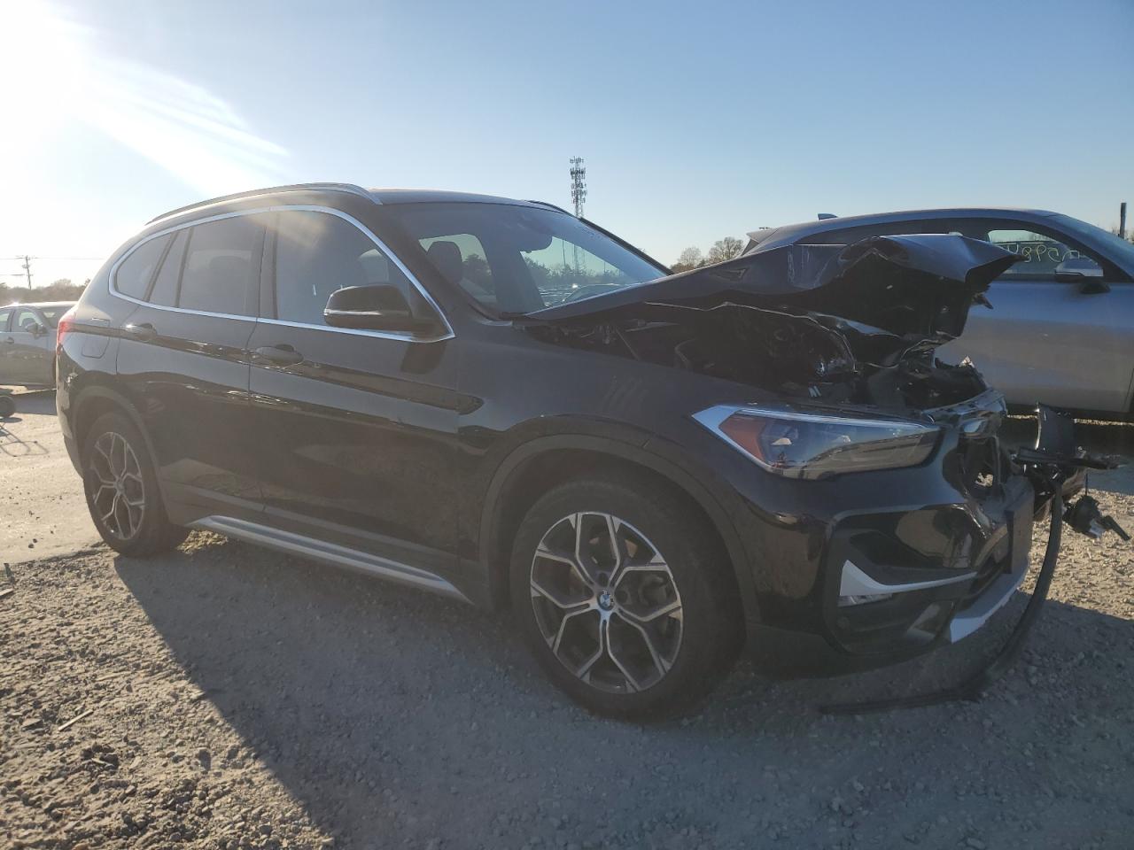 2020 BMW X1 VIN WBXJG9C06L5P79804 Copart auction photo, front end / minor dent/scratches damage thumbnail 4