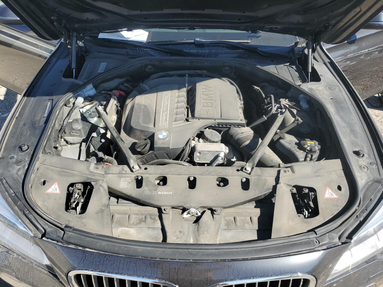 2015 BMW 7er VIN WBAYA6C52FGK16391 Copart auction photo, side / front end damage thumbnail 11