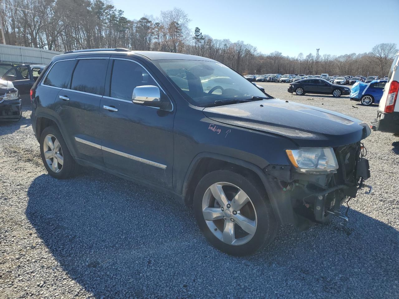 2012 Jeep Grand Cherokee VIN 1C4RJECG8CC211136 Copart auction photo, front end / minor dent/scratches damage thumbnail 4