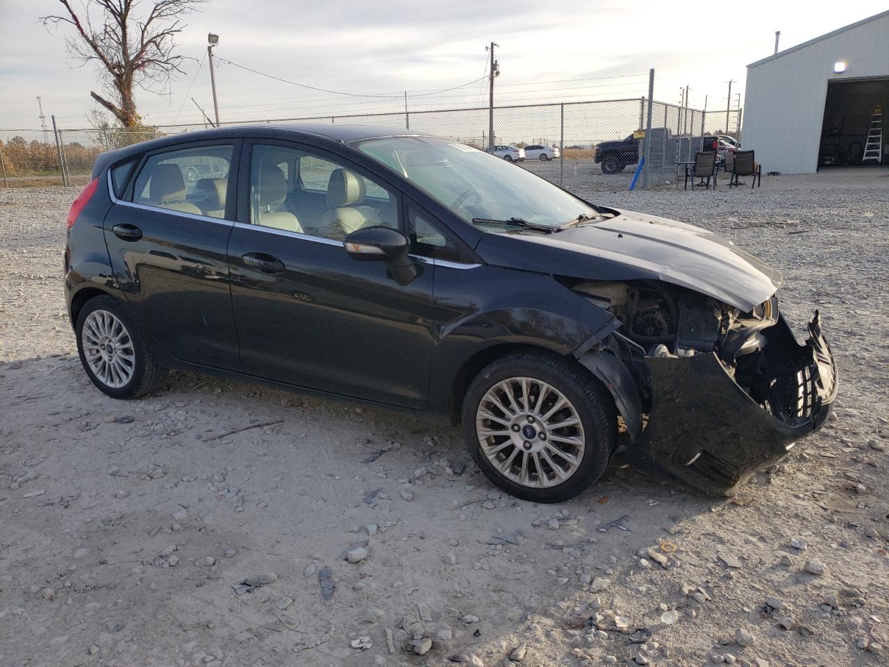 2014 Ford Fiesta VIN 3FADP4FJ5EM176850 Copart auction photo, front end / minor dent/scratches damage thumbnail 4