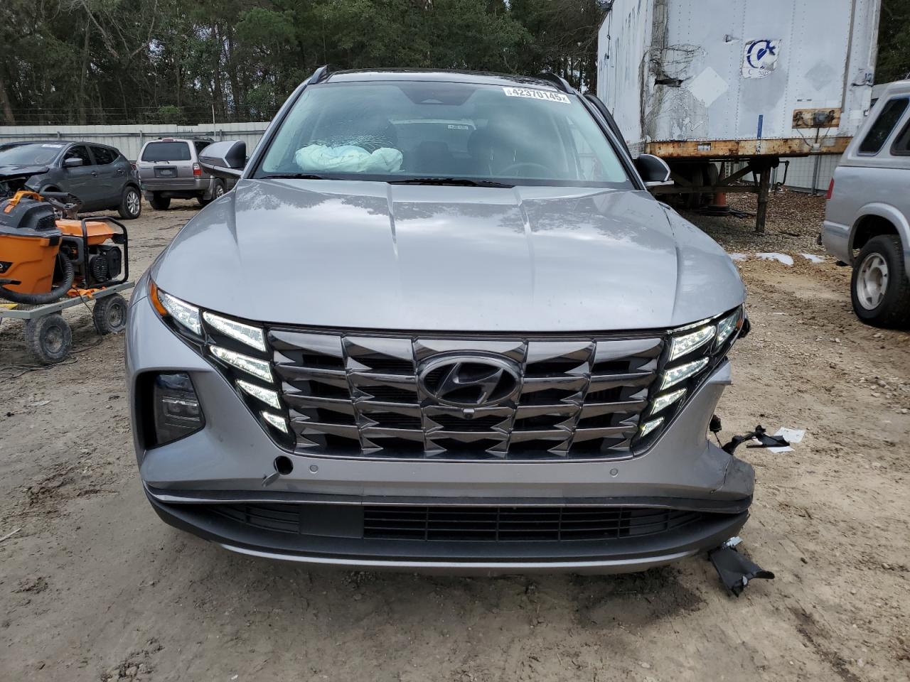 2022 Hyundai Tucson VIN KM8JECA15NU083564 Copart auction photo, front end / side damage thumbnail 5
