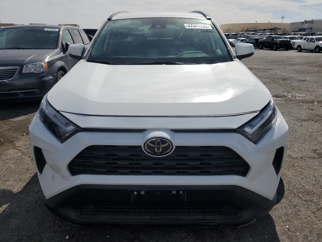 2022 Toyota RAV 4 VIN 2T3P1RFV6NW291383 Copart auction photo, side / undercarriage damage thumbnail 5