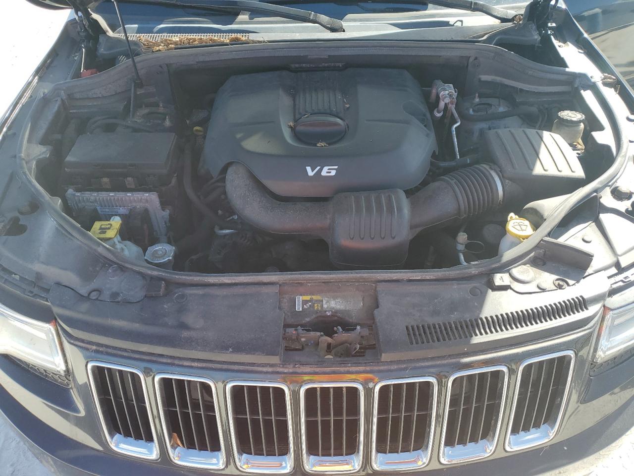 2015 Jeep Grand Cherokee VIN 1C4RJFBGXFC827657 Copart auction photo, water/flood damage thumbnail 12