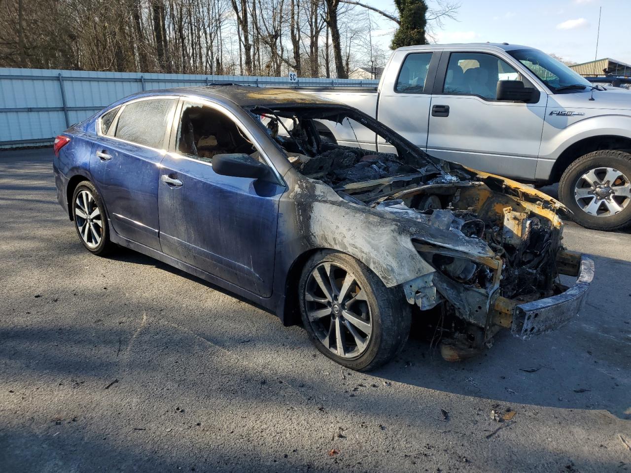 2016 Nissan Altima VIN 1N4AL3AP8GC155614 Copart auction photo, burn damage thumbnail 4