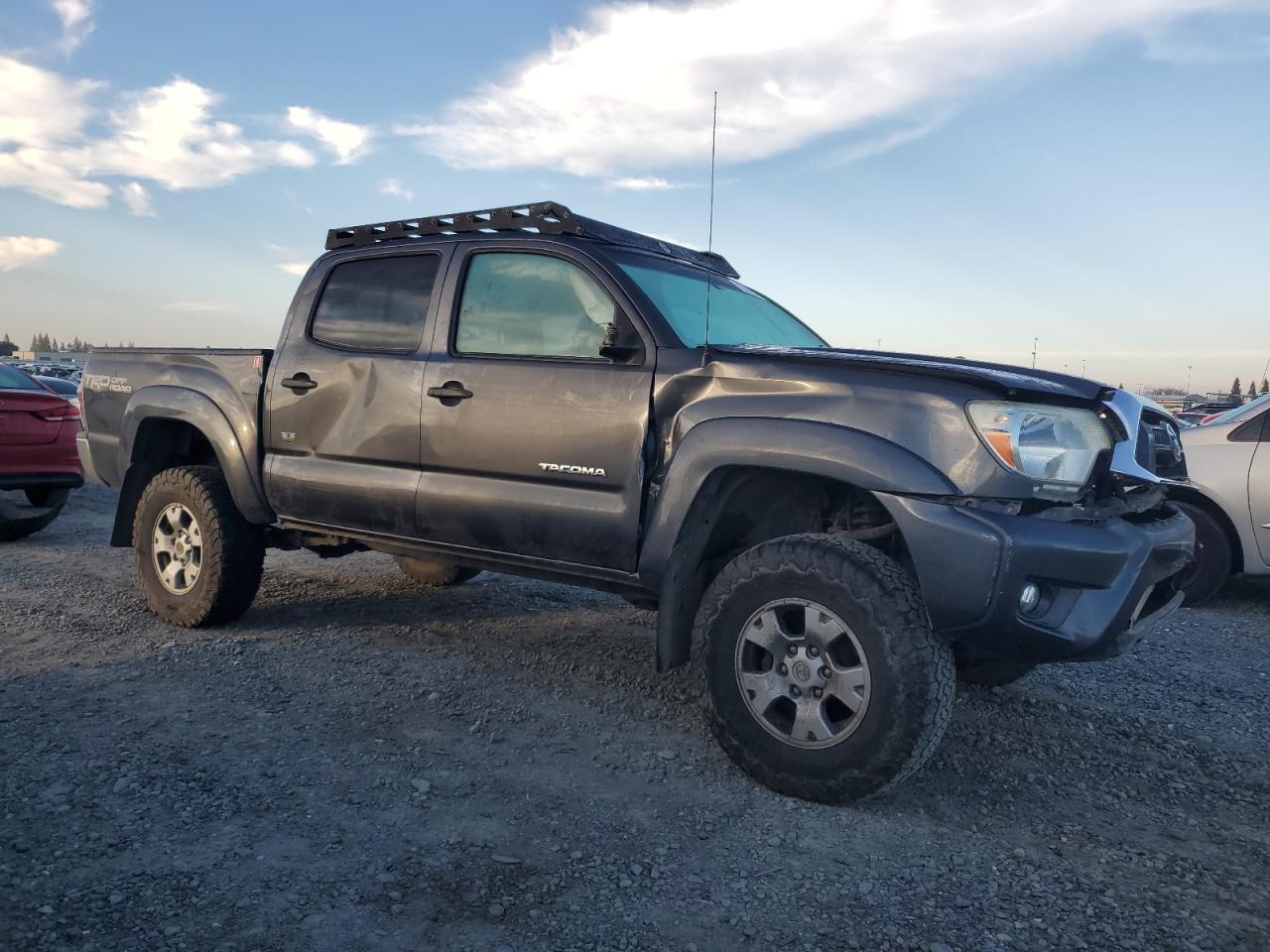 2015 Toyota Tacoma VIN 3TMLU4ENXFM173463 Copart auction photo, all over damage thumbnail 4