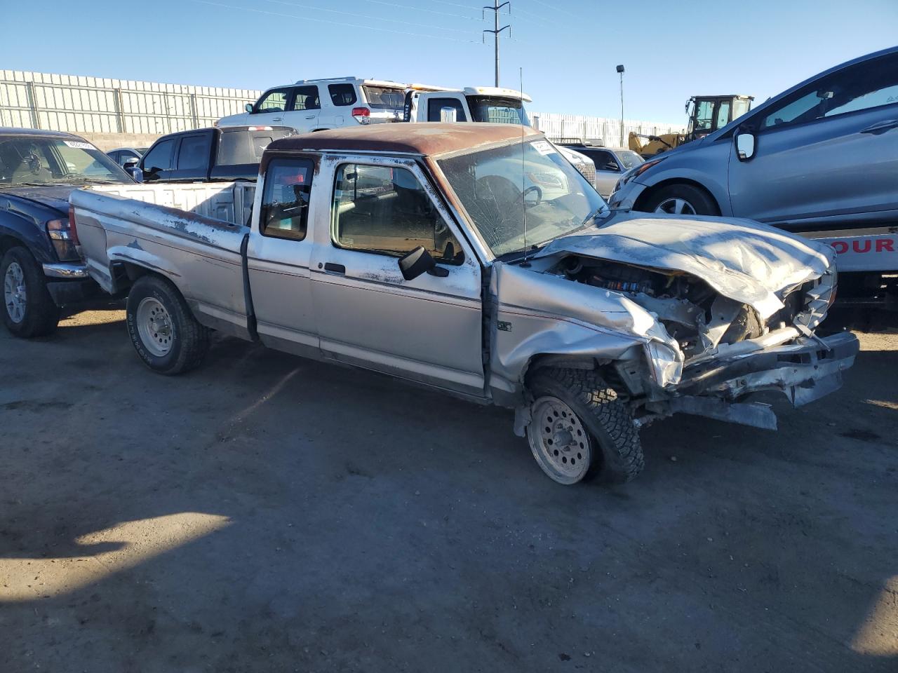 1991 Ford Ranger VIN 1FTCR15T2MPA03393 Copart auction photo, all over damage thumbnail 4