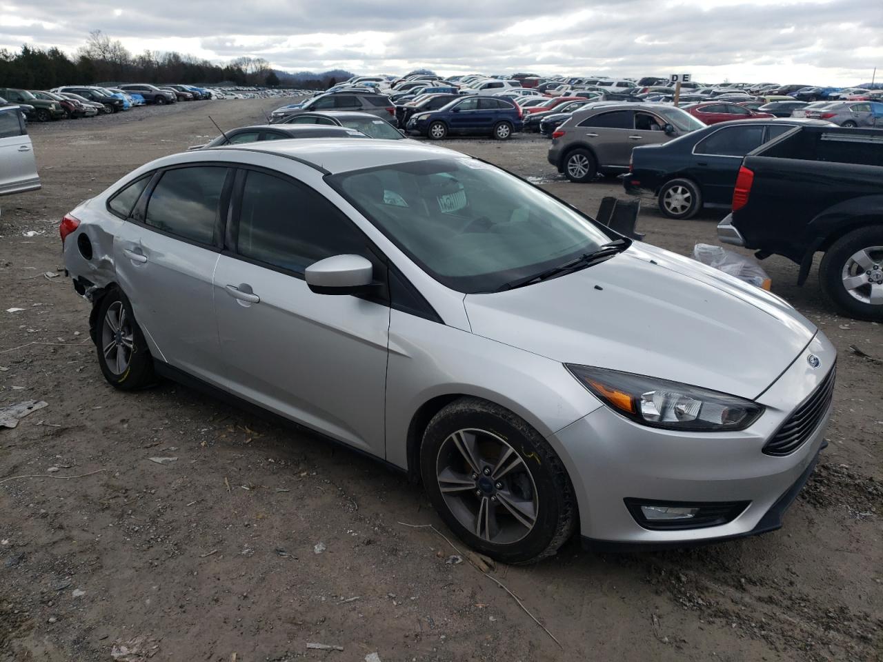 2018 Ford Focus VIN 1FADP3FE8JL214354 Copart auction photo, side / undercarriage damage thumbnail 4