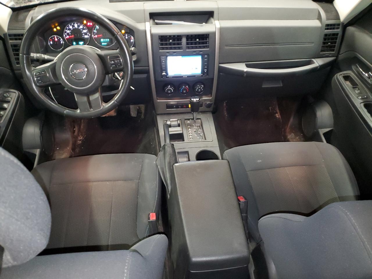 2012 Jeep Liberty (North America) VIN 1C4PJMAKXCW203871 Copart auction photo, side / rear end damage thumbnail 8