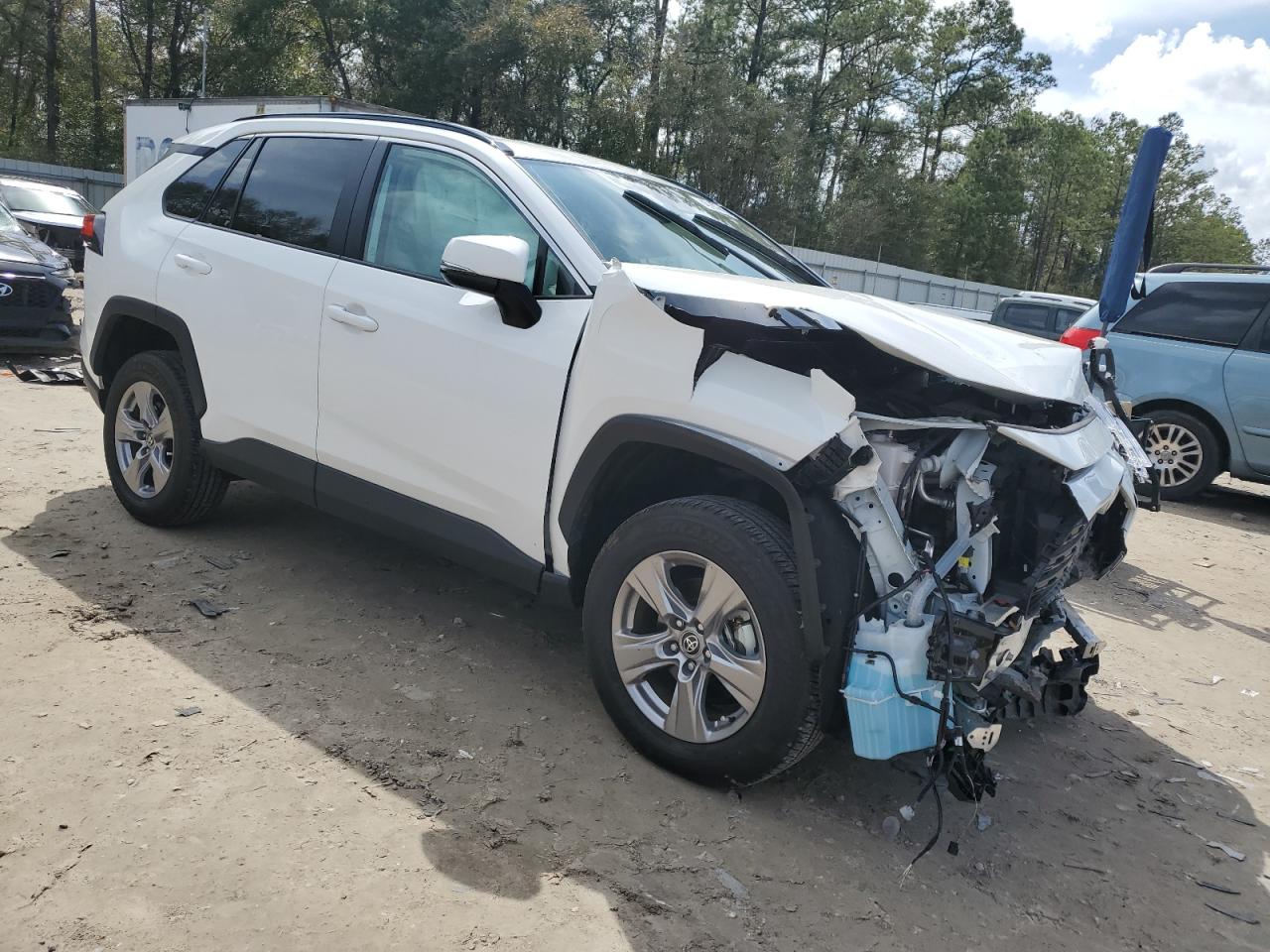 2023 Toyota RAV 4 VIN 2T3W1RFVXPC227850 Copart auction photo, front end damage thumbnail 4