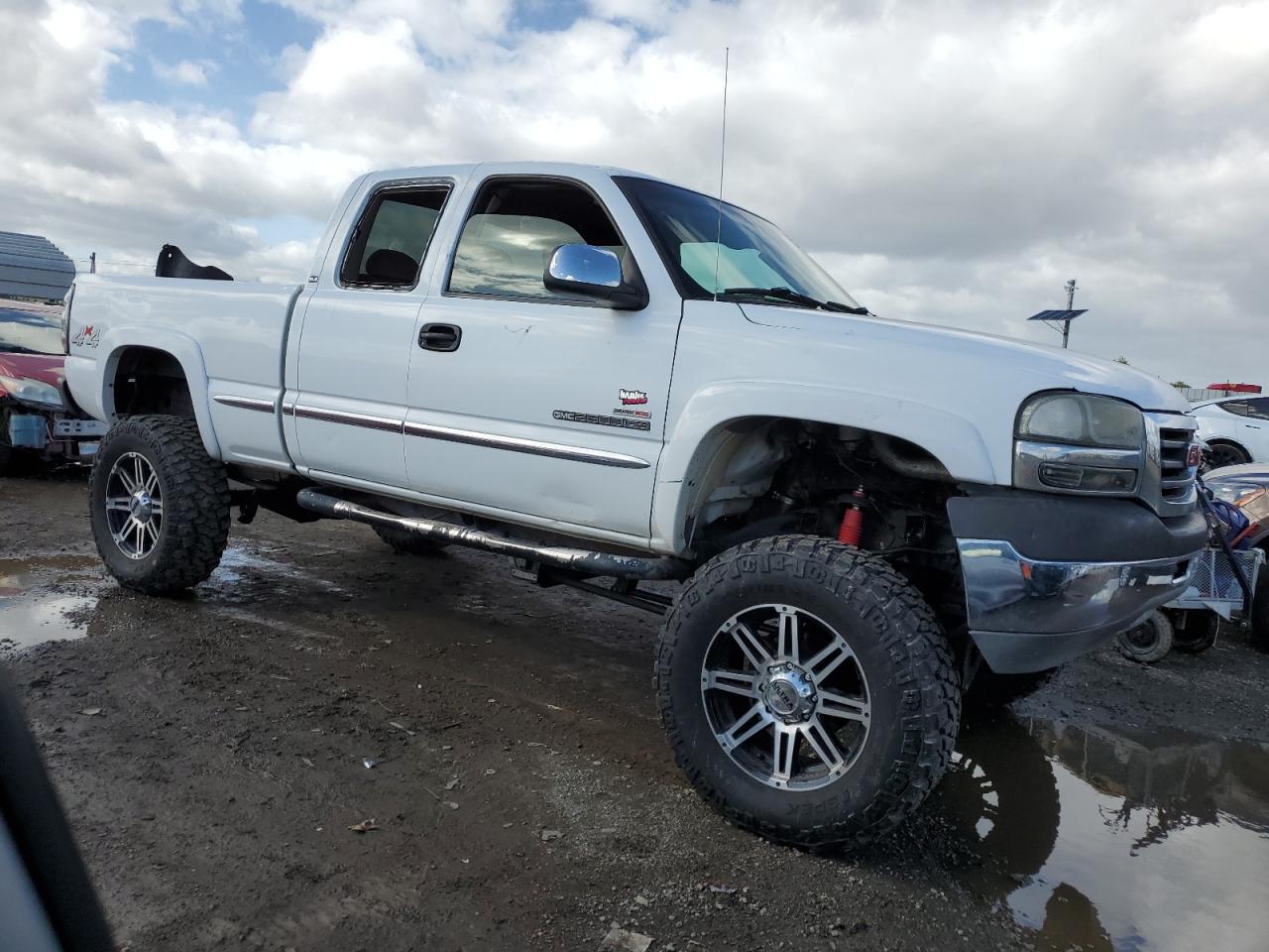 2001 GMC Sierra VIN 1GTHK29131E317389 Copart auction photo, minor dent/scratches damage thumbnail 4