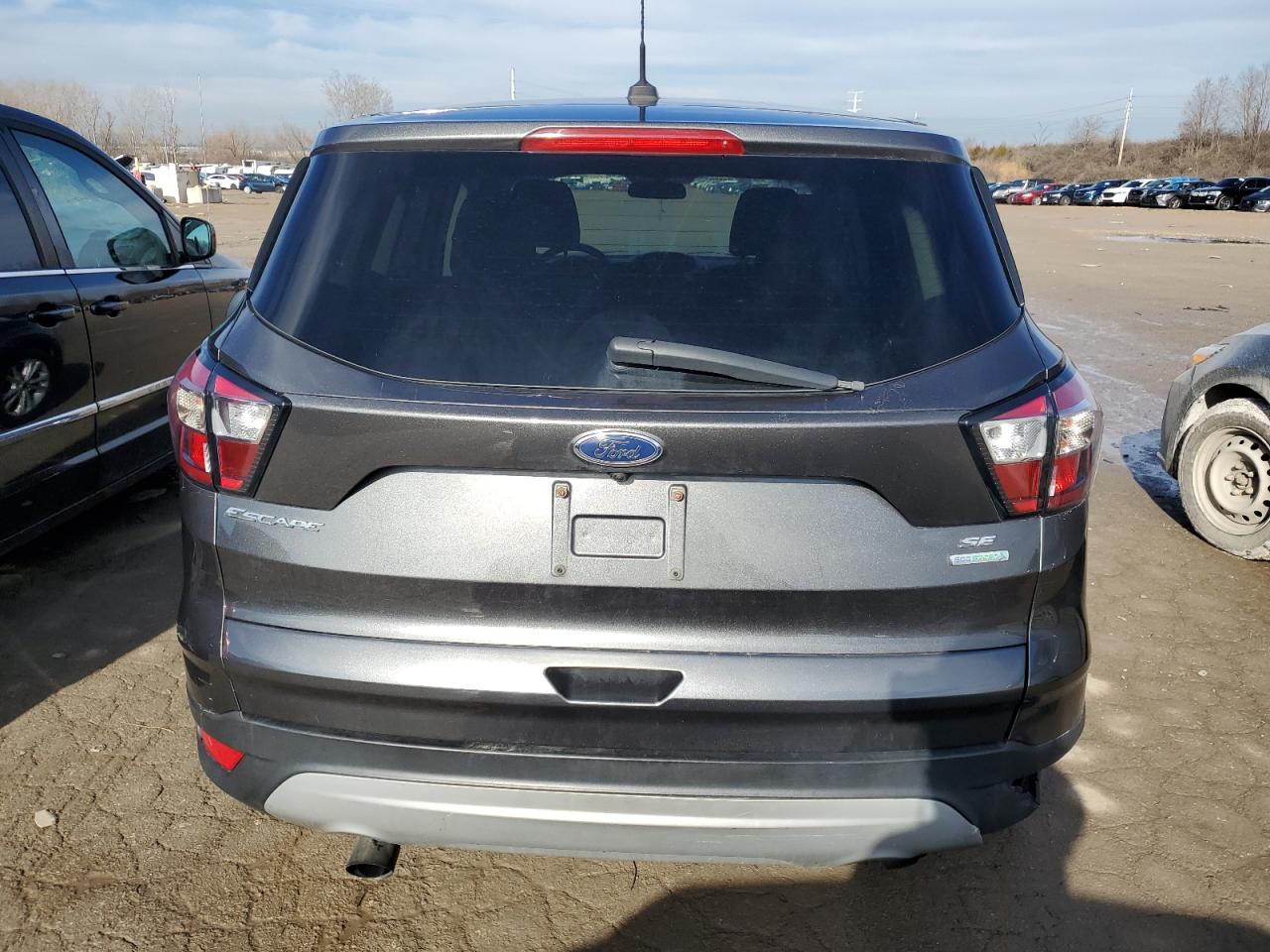 2017 Ford Escape VIN 1FMCU0GDXHUE10346 Copart auction photo, mechanical / side damage thumbnail 6