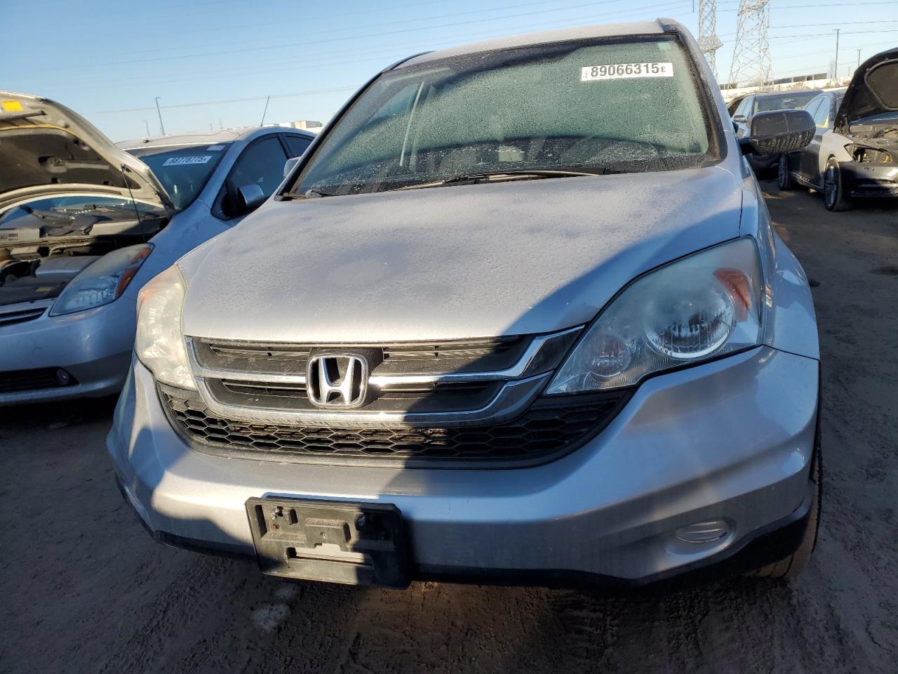 2010 Honda CR-V VIN 5J6RE4H38AL006685 Copart auction photo, side damage thumbnail 5