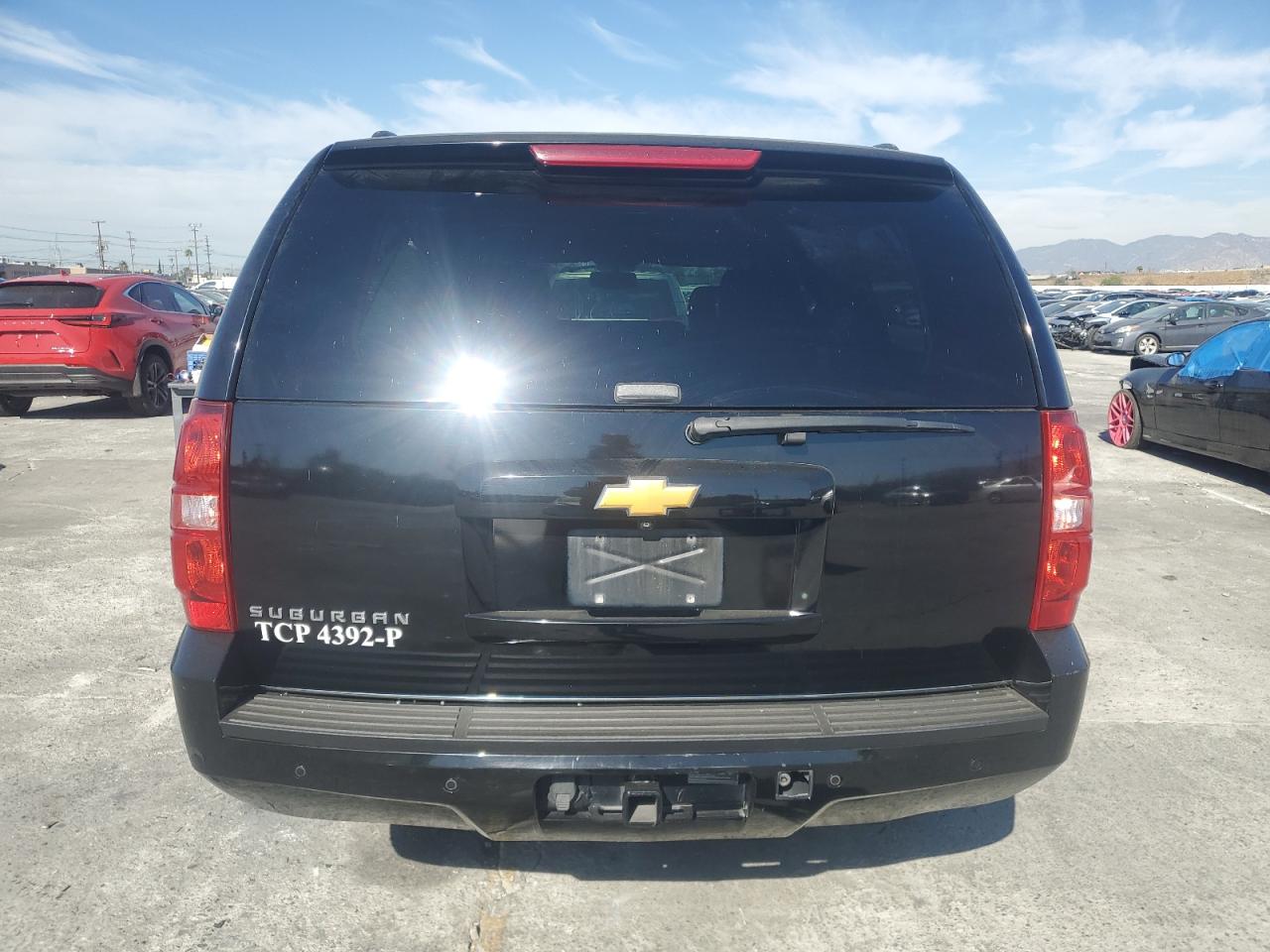 2014 Chevrolet Suburban VIN 1GNSCJE00ER230615 Copart auction photo, front end damage thumbnail 6