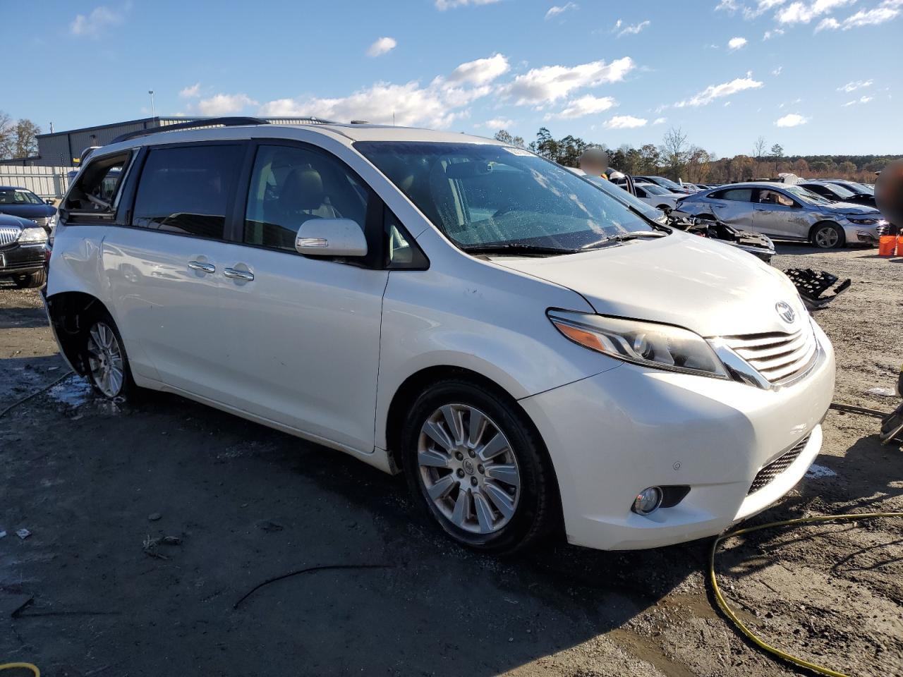 2015 Toyota Sienna VIN 5TDYK3DC0FS556625 Copart auction photo, rear end damage thumbnail 4