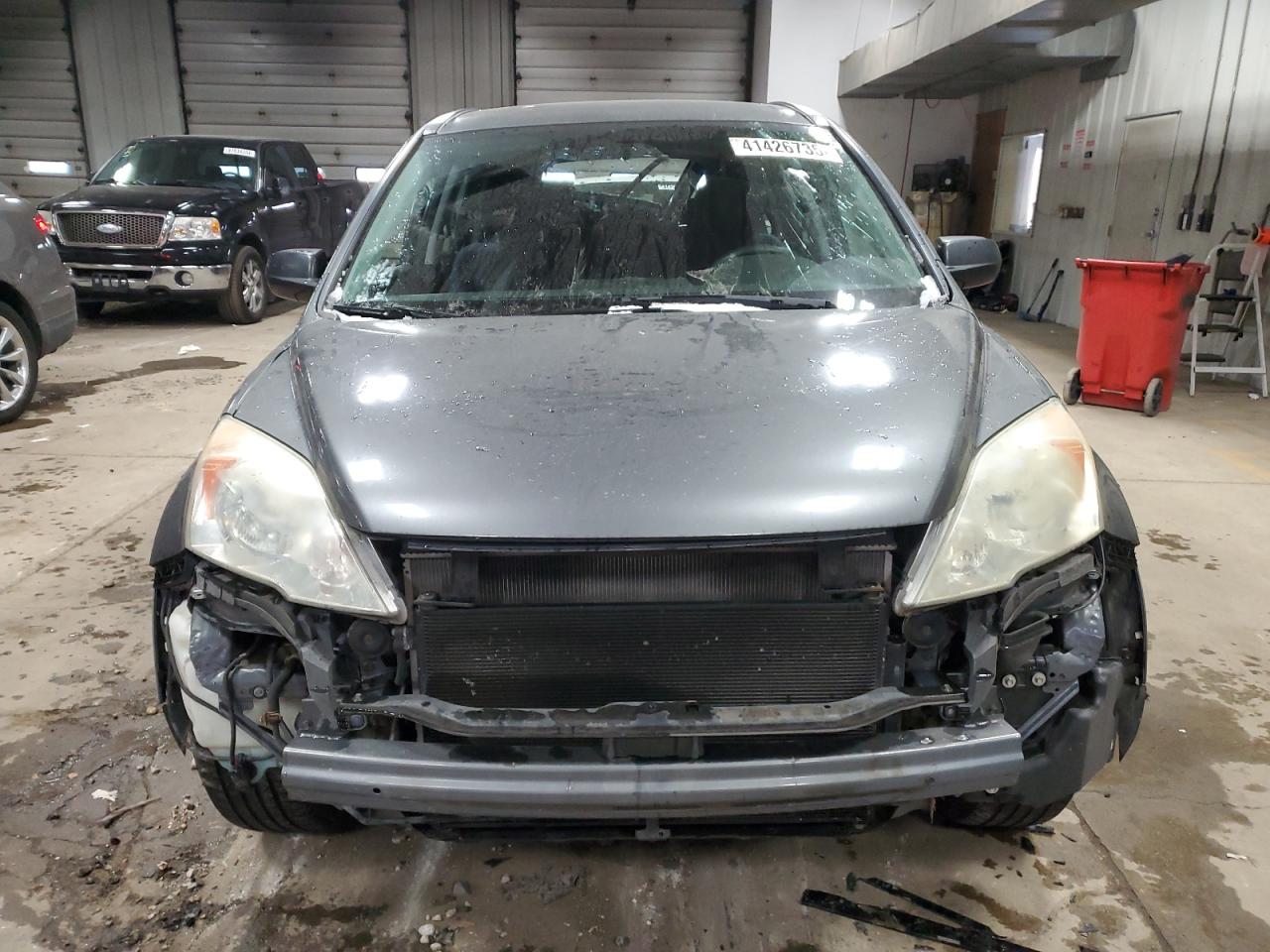 2010 Honda CR-V VIN 3CZRE3H35AG701696 Copart auction photo, all over damage thumbnail 5
