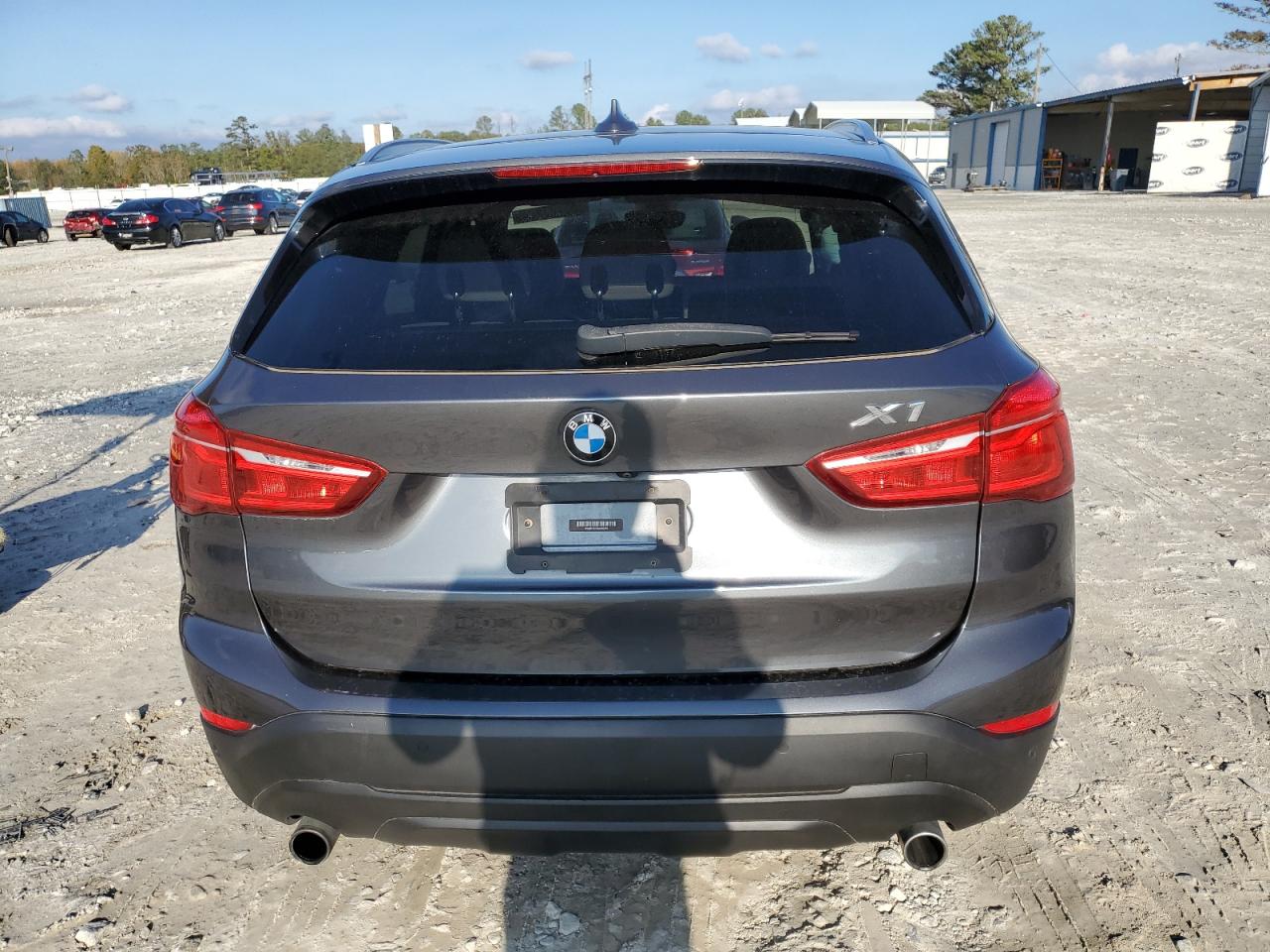 2016 BMW X1 VIN WBXHT3C33GP882254 Copart auction photo, side / front end damage thumbnail 6