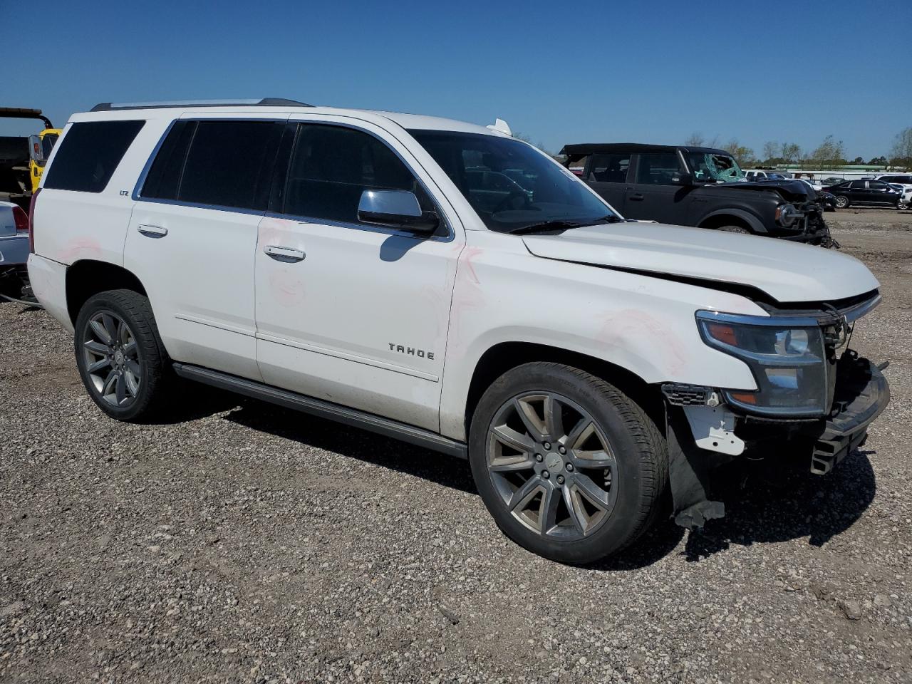 2015 Chevrolet Tahoe VIN 1GNSCCKC1FR666790 Copart auction photo, front end / side damage thumbnail 4