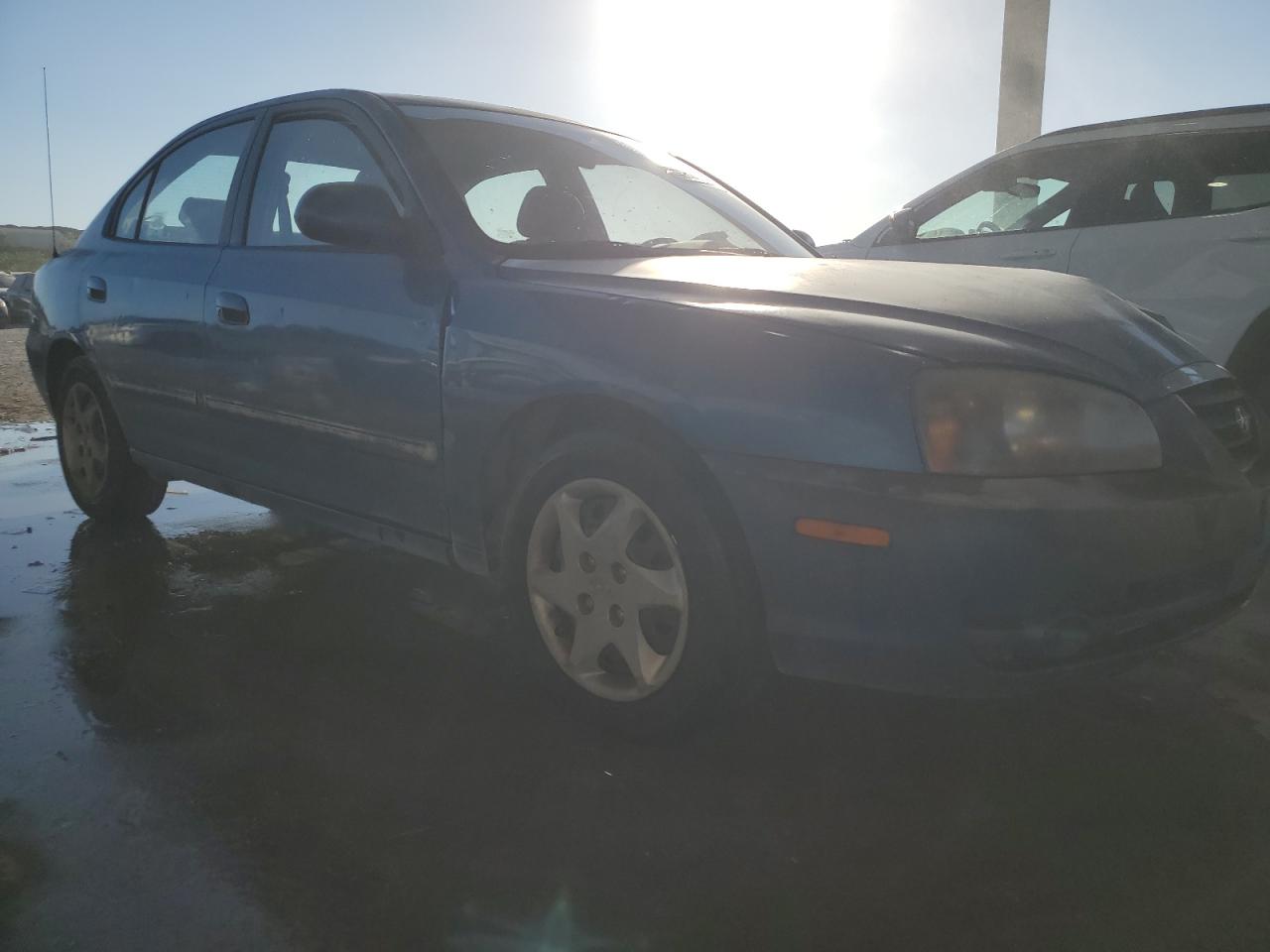 2004 Hyundai Elantra VIN KMHDN46D24U873036 Copart auction photo, front end / minor dent/scratches damage thumbnail 4