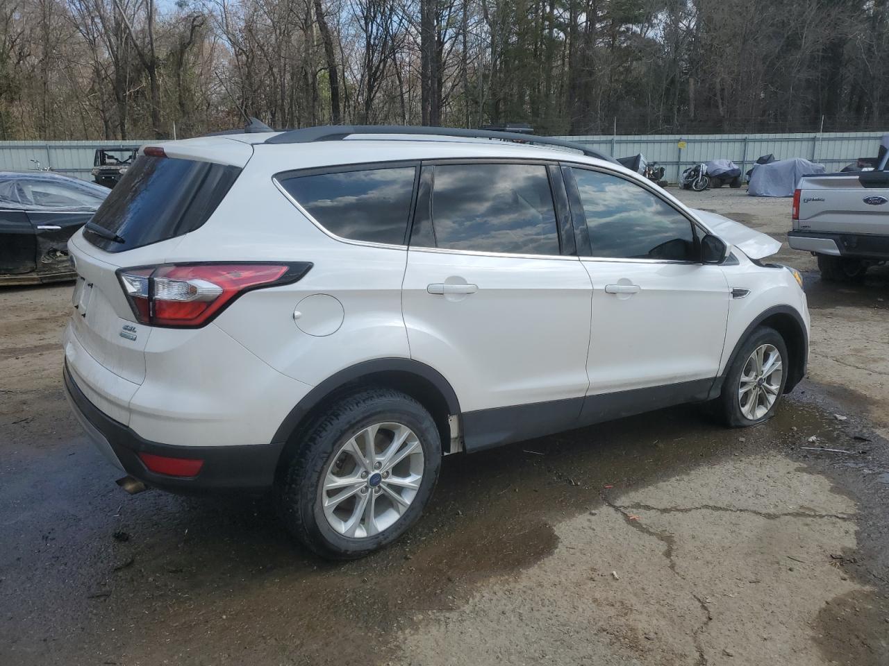 2018 Ford Escape VIN 1FMCU0HDXJUD26175 Copart auction photo, side / minor dent/scratches damage thumbnail 3
