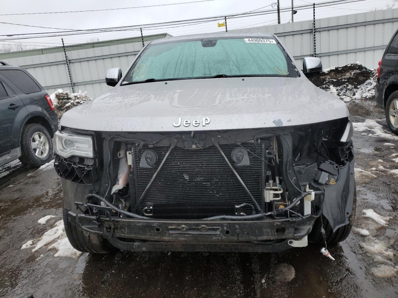 2014 Jeep Grand Cherokee VIN 1C4RJFBG8EC159923 Copart auction photo, front end / rear end damage thumbnail 5