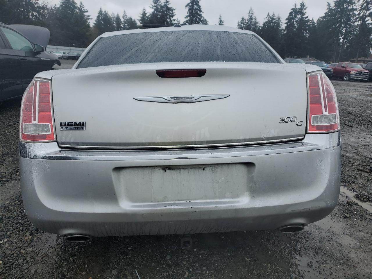 2012 Chrysler 300 VIN 2C3CCAET5CH146525 Copart auction photo, front end / top/roof damage thumbnail 6