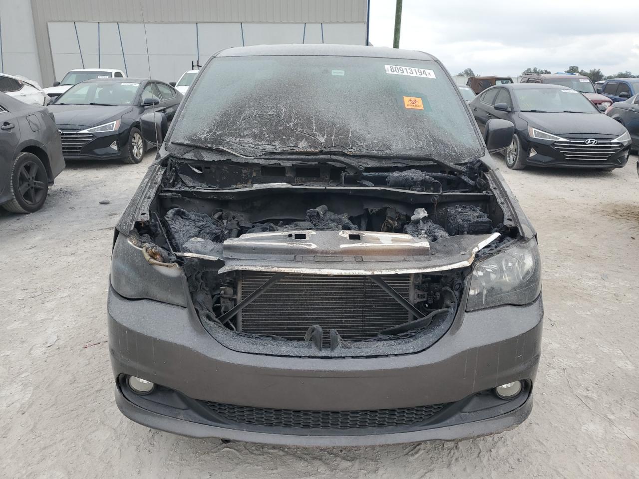 2017 Dodge Caravan VIN 2C4RDGCG7HR612159 Copart auction photo, burn - engine damage thumbnail 5
