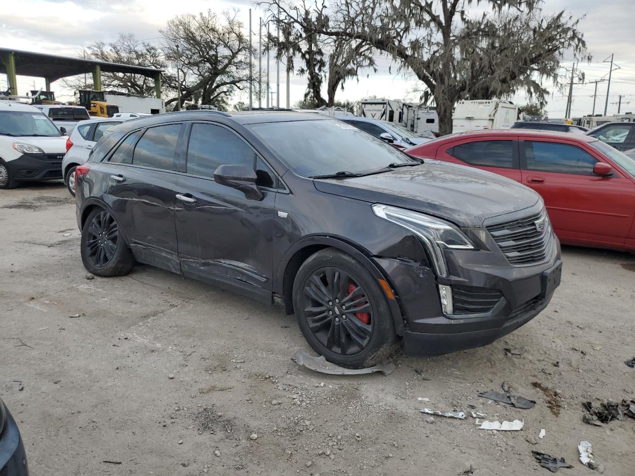 2019 Cadillac XT5 VIN 1GYKNFRSXKZ125498 Copart auction photo, side / rear end damage thumbnail 4