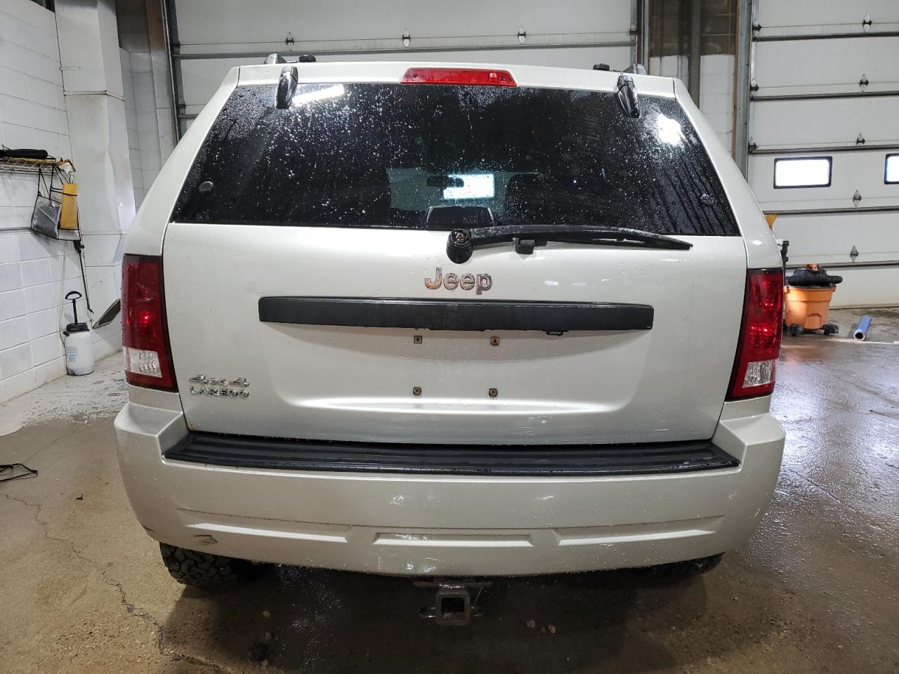 2009 Jeep Grand Cherokee VIN 1J8GR48K69C513923 Copart auction photo, front end / hail damage thumbnail 6
