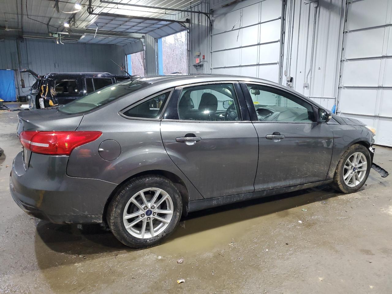 2015 Ford Focus VIN 1FADP3F28FL234004 Copart auction photo, all over damage thumbnail 3