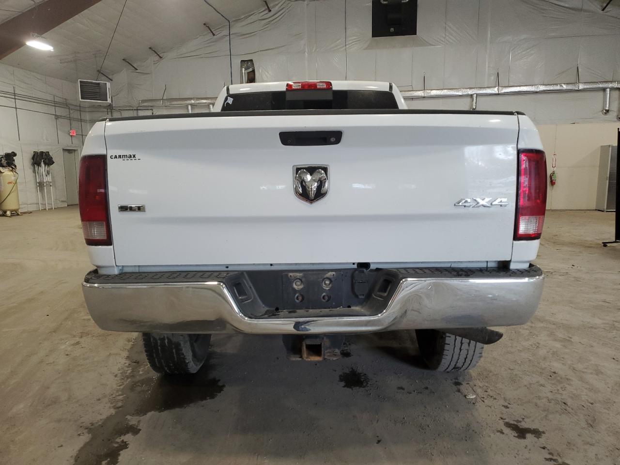 2018 RAM 2500 VIN 3C6TR5DT3JG411238 Copart auction photo, side / minor dent/scratches damage thumbnail 6